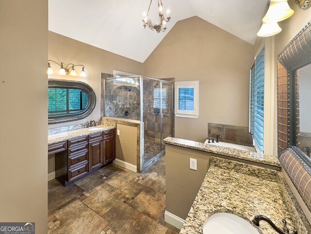 bathroom with vanity, separate shower and tub, and high vaulted ceiling