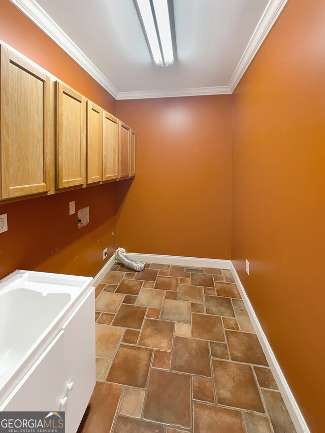 laundry room with cabinets and ornamental molding