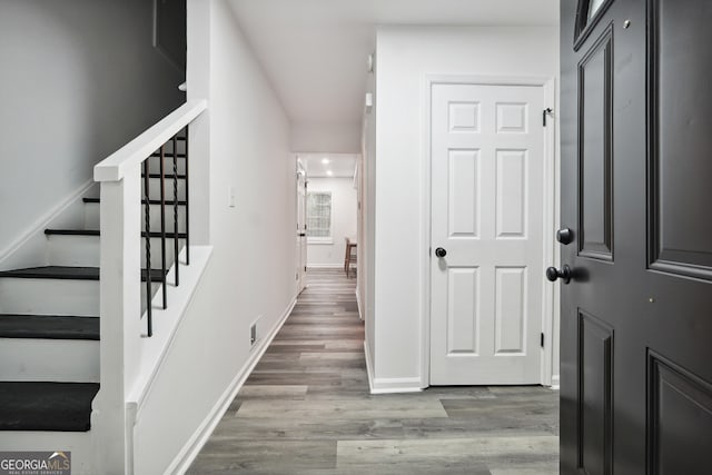 hallway featuring hardwood / wood-style flooring