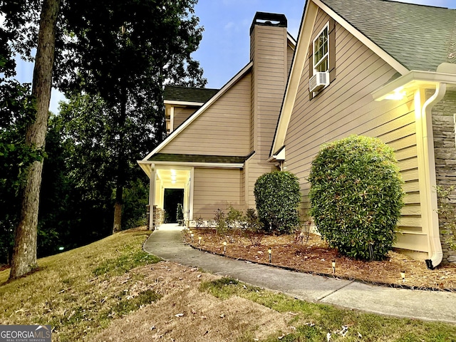 view of side of home featuring a patio area