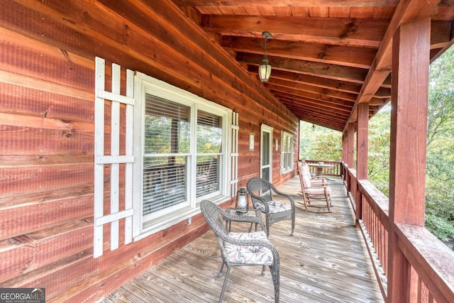 wooden deck featuring a porch