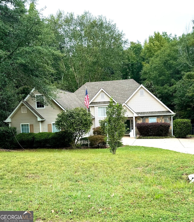 view of front of home with a front yard