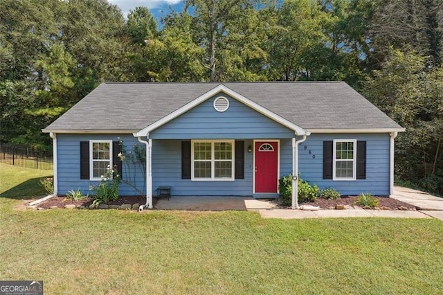 single story home with a front lawn and a porch