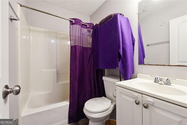 full bathroom with toilet, vanity, shower / bath combo with shower curtain, and a textured ceiling