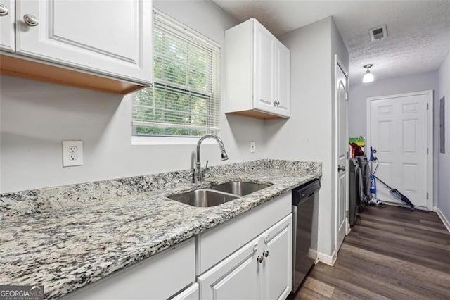 kitchen with white cabinets, dishwasher, sink, dark hardwood / wood-style floors, and light stone counters