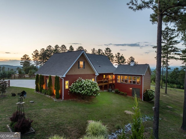 view of front of property with a lawn