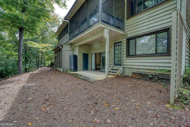 rear view of property with a patio