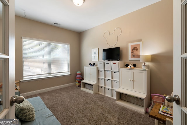 interior space featuring carpet flooring