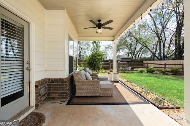 view of patio / terrace with ceiling fan and outdoor lounge area