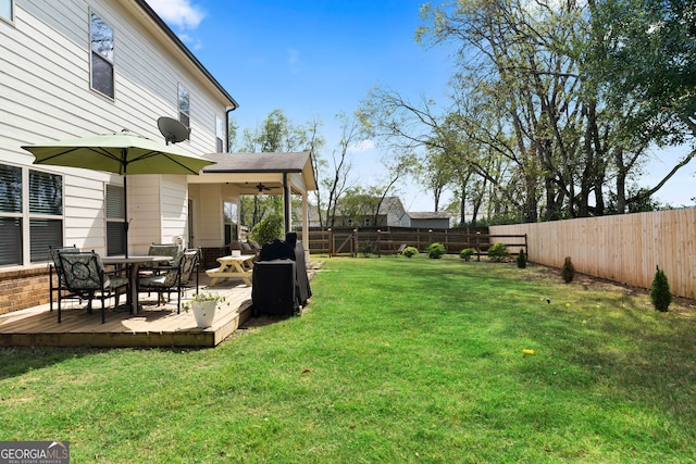 view of yard with a deck