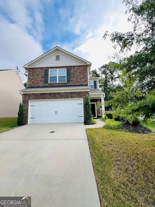 view of front of house with a front lawn and a garage