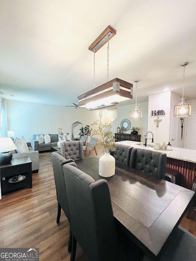 dining area featuring hardwood / wood-style floors