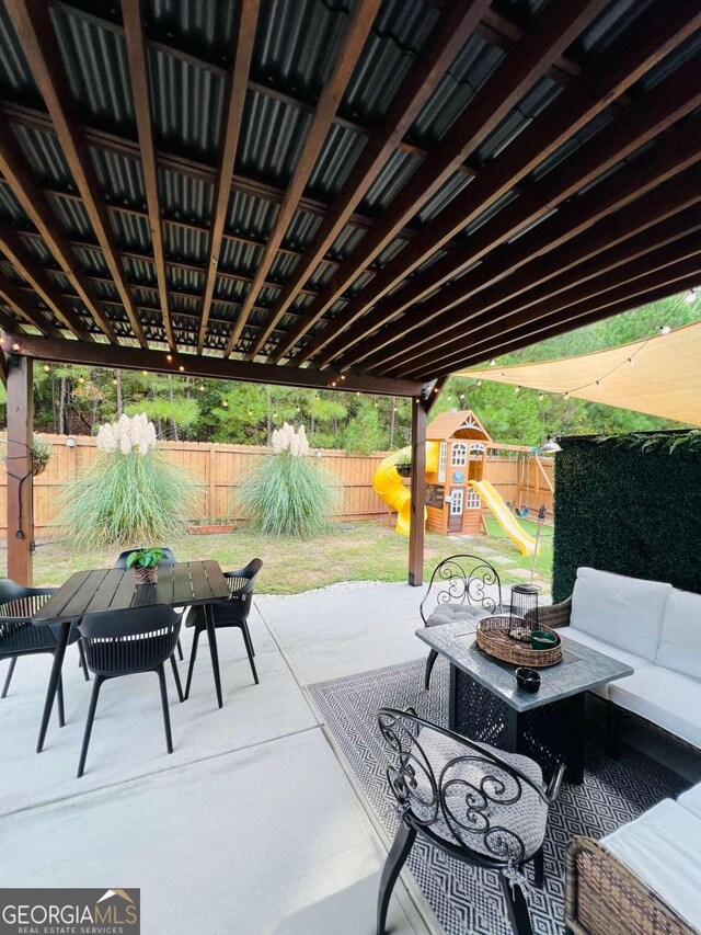 view of patio with a playground