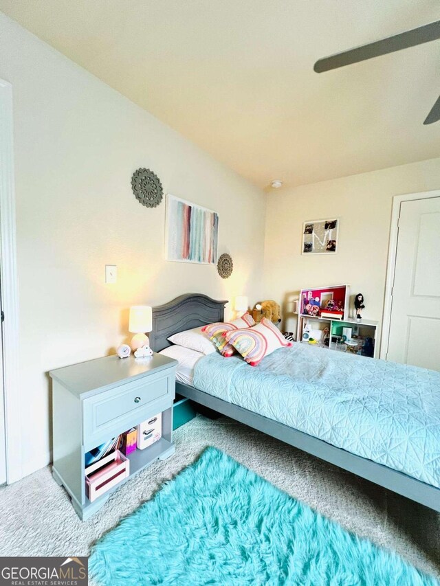 bedroom with carpet floors and ceiling fan