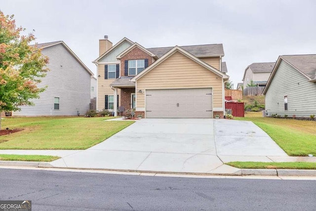 view of front of house with a front lawn and a garage