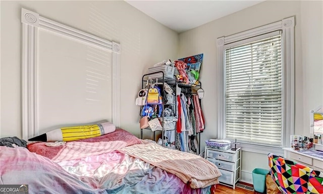 bedroom featuring wood-type flooring