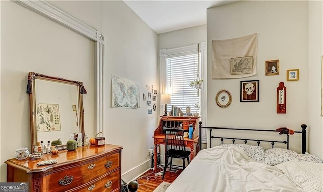 bedroom featuring hardwood / wood-style floors