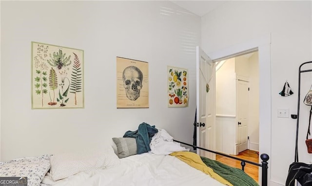 bedroom featuring hardwood / wood-style floors