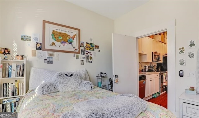 bedroom featuring hardwood / wood-style flooring