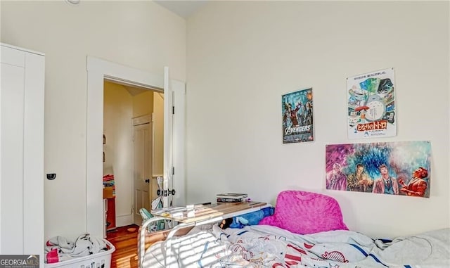 bedroom featuring hardwood / wood-style floors