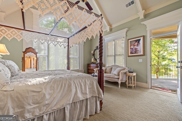 carpeted bedroom with access to outside, ornamental molding, and lofted ceiling