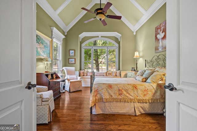 bedroom featuring dark hardwood / wood-style flooring, ornamental molding, high vaulted ceiling, and ceiling fan