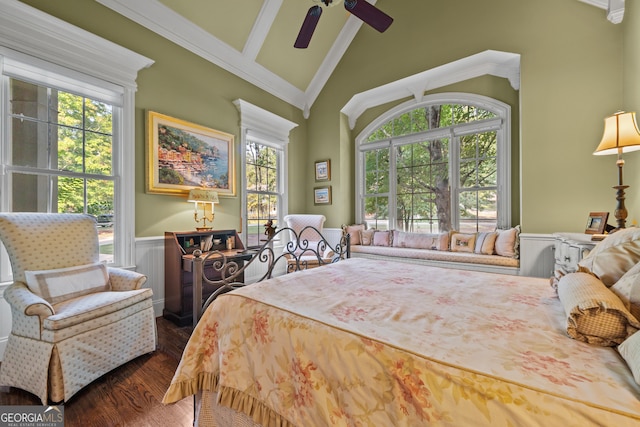 bedroom with multiple windows, dark wood-type flooring, and ceiling fan