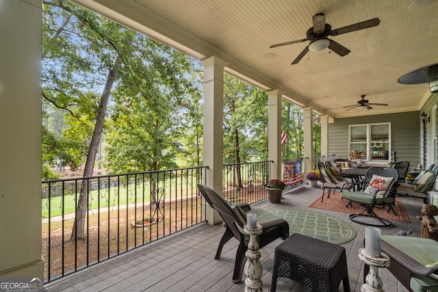 wooden terrace with ceiling fan