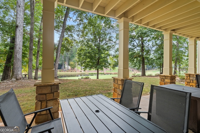 wooden deck with a yard