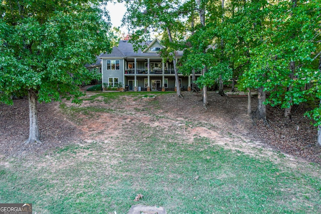 view of yard featuring covered porch