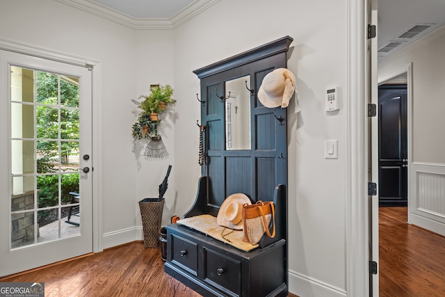 mudroom with ornamental molding and dark hardwood / wood-style floors