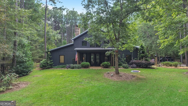 view of front of home with a front lawn