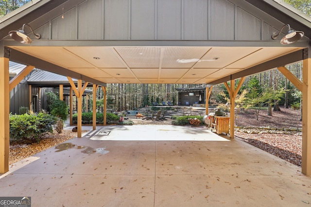 view of patio featuring a carport