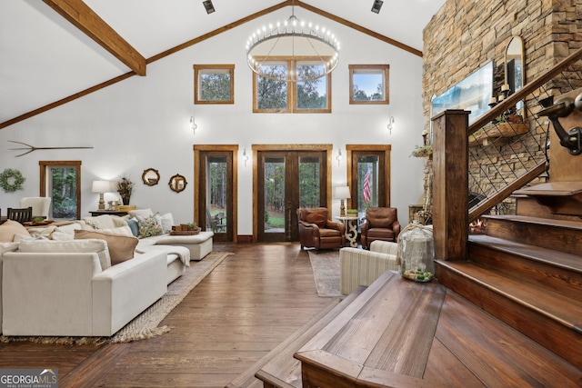 living room with beamed ceiling, ceiling fan with notable chandelier, dark hardwood / wood-style floors, and high vaulted ceiling