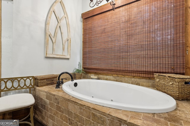 bathroom with tiled tub