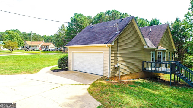 garage with a lawn