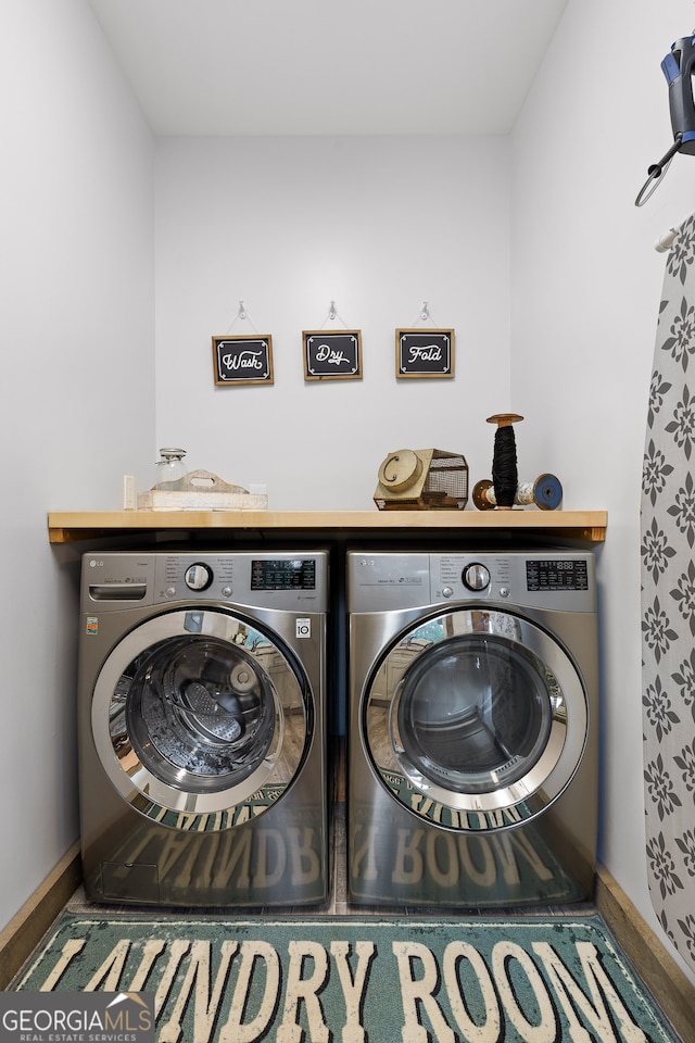 laundry area featuring separate washer and dryer