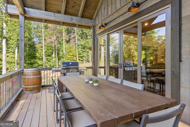 sunroom / solarium with vaulted ceiling and wooden ceiling