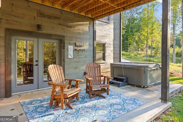 sunroom featuring french doors