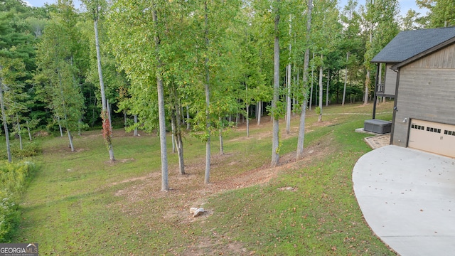 view of yard featuring a garage