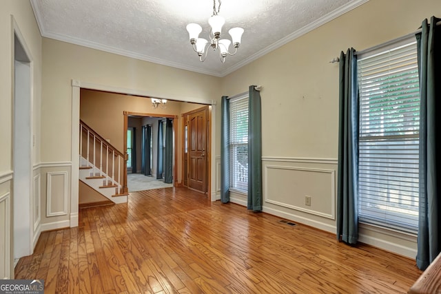 interior space featuring light wood-type flooring and a wealth of natural light