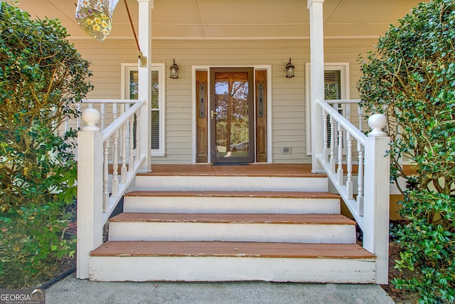 entrance to property with covered porch