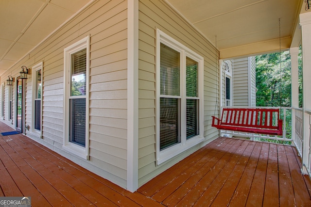 deck featuring covered porch