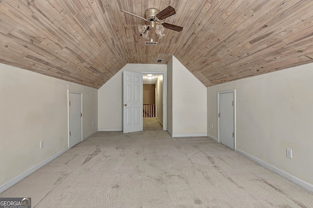 additional living space featuring ceiling fan, light carpet, vaulted ceiling, and wooden ceiling