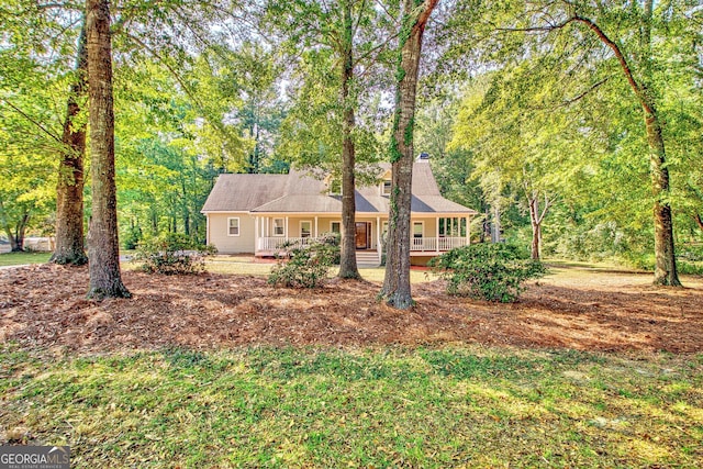 view of front of property featuring covered porch