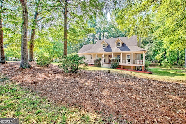 cape cod house with covered porch