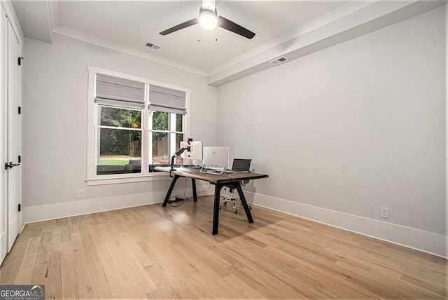 office space with ceiling fan, light wood-type flooring, and ornamental molding