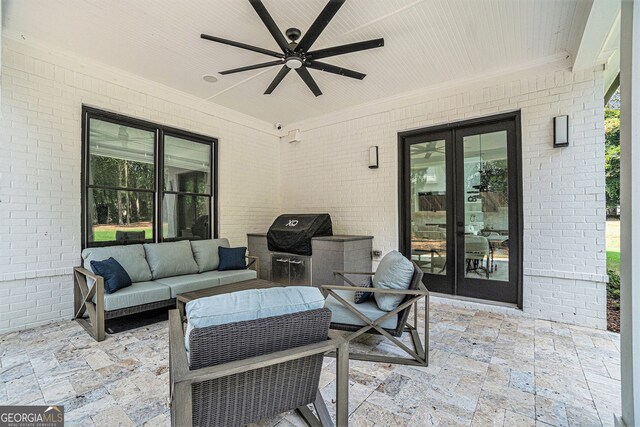 view of patio / terrace with area for grilling, outdoor lounge area, and ceiling fan