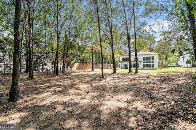 view of yard with a sunroom