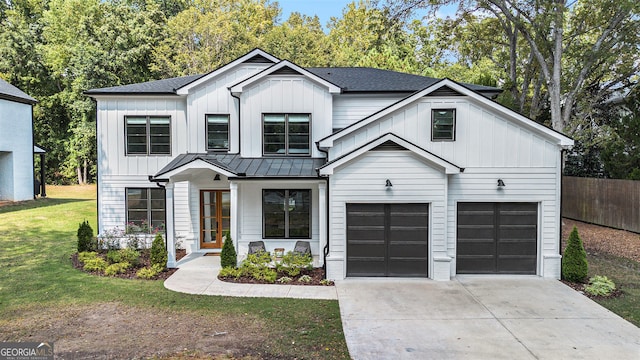 modern inspired farmhouse featuring a front yard